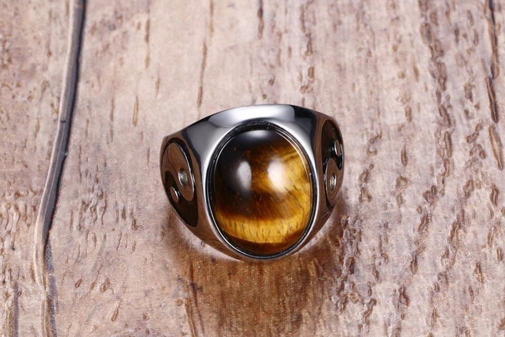 Men's trendy titanium steel ring with polished tiger eye stone centerpiece. Durable and stylish design ideal for modern fashion accessories.